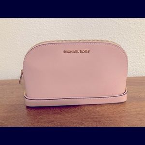 Brand new, never used, Michael kors cosmetic case AND wallet.